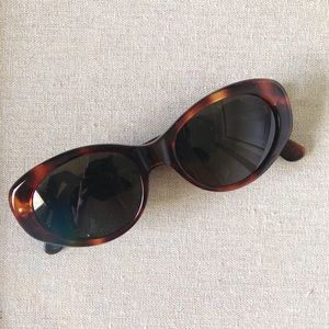 Yves Saint Laurent Tortoiseshell Oval Sunglasses with Black Lenses